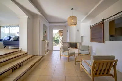 a living room with a couch and chairs at Villa rénovée- Vue mer- Centre de Cannes in Cannes