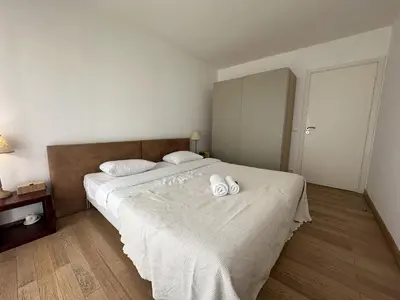 a bedroom with a bed with two towels on it at Charmant 2P Cannes PEL1900 in Cannes