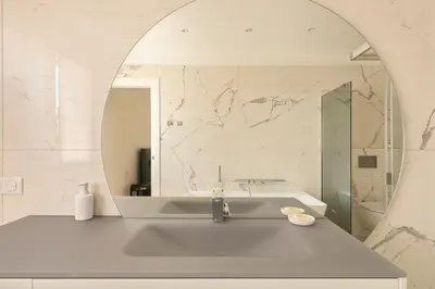 a bathroom with a sink and a mirror at Villa California Cannes Private Pool in Cannes