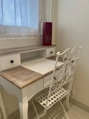 a white desk with a chair and a window at Sea view Croisette in Cannes