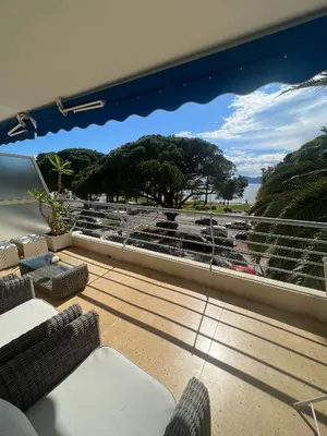 a balcony with a view of a parking lot at Sea view Croisette in Cannes