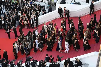 a large group of people on the red carpet at a premiere at B066 Studio design à 5 mn de la plage in Cannes