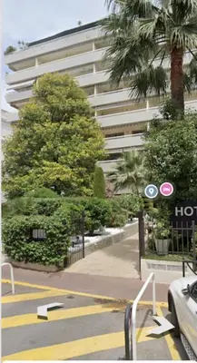 a street with a parking lot with a building at Appartement Cannes Centre Proche de la Croisette! in Cannes