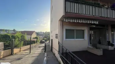 a balcony of a building with a window at Appartement studio Cannes in Cannes