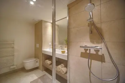 a bathroom with a shower with a toilet and a sink at Sublime Studio TERRASSE, Edith Cavell- proche CROISETTE A0B196 in Cannes