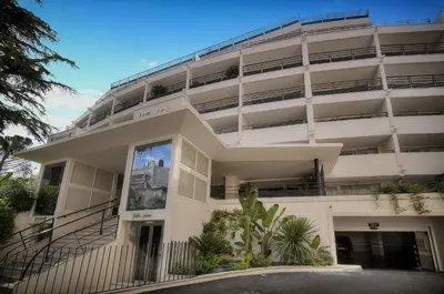 an apartment building with balconies on the side of it at Sublime Studio TERRASSE, Edith Cavell- proche CROISETTE A0B196 in Cannes