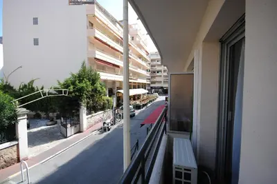 a balcony of a building with a view of a street at superbe appartement tout confort beg4012 in Cannes