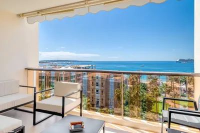 a living room with a view of the ocean at Charming oasis with terrace 4 BD- 8P - Cannes in Cannes