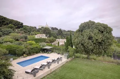 an aerial view of a house with a swimming pool at Twin Luxurious Villas 8 BR Pool in Vallauris in Vallauris