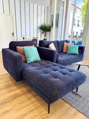 a living room with two couches and a blue couch at Dolce Cannes Riviera Cannes in Cannes