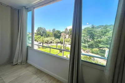 a room with a large window with a view at CANNES - STUDIO proximité Mer et commerces in Cannes