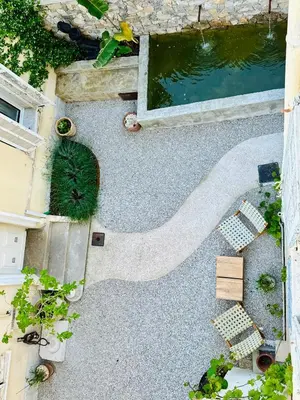 an overhead view of a garden with a pond at Maison LYO logement Luxe in Cannes