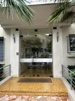 an entrance to a store with a glass door at Marble elegancy in Cannes center in Cannes
