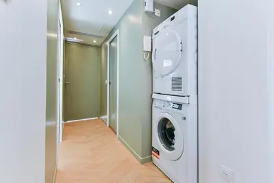a laundry room with a washer and dryer at Hypercentre - 5mn croisette - Palais - Plage - CF in Cannes