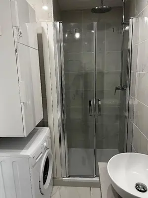 a bathroom with a shower and a toilet and a sink at Studio neuf centre Cannes 500 m plage in Cannes