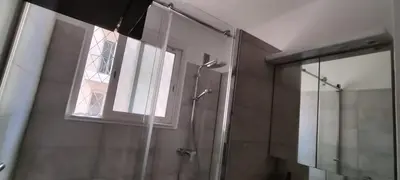 a bathroom with a shower and a window at T3 spacious 60 m near the beach of Cannes in Cannes
