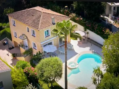 an aerial view of a house with a swimming pool at Cannes centre Villa piscine spa in Cannes