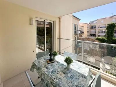 a balcony with a table with plants on it at PDA4 - 2 pièces avec terrasse in Cannes