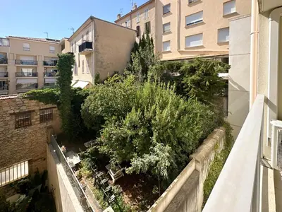 an apartment with a garden on a balcony at PDA4 - 2 pièces avec terrasse in Cannes