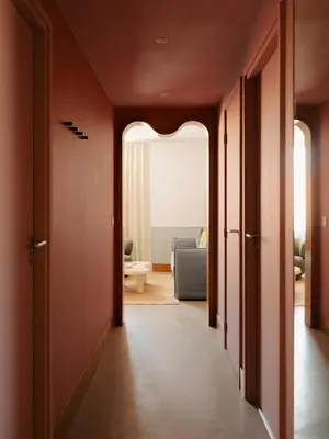 a hallway with a living room with a couch at Edgar Suites Cannes - Rue d'Antibes in Cannes