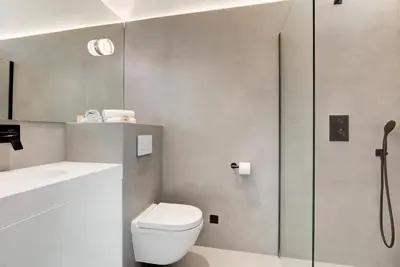 a bathroom with a toilet and a shower at Immogroom - 2 min du palais - Studio - Luxury - AC in Cannes