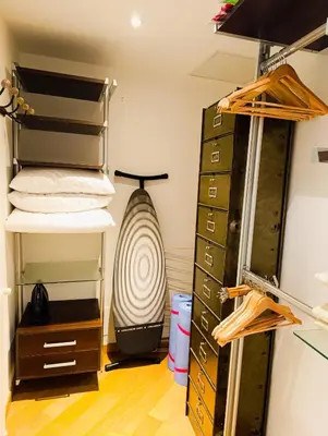 a room with a bunch of drawers and a shelf at Design Appartment 100sqm close to Palais Beach and Restaurants in Cannes