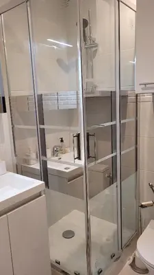 a bathroom with a shower and a sink and a toilet at Studio in Cannes