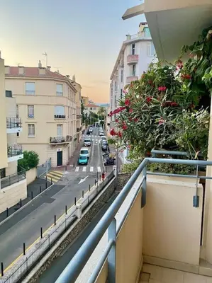 a view of a city street from a balcony at Modern Apartment in Cannes in Cannes