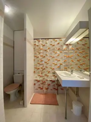a bathroom with a sink and a toilet at Modern Apartment in Cannes in Cannes