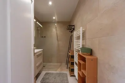 a bathroom with a shower and a sink at 1-Br Renovated Near Croisette in Cannes