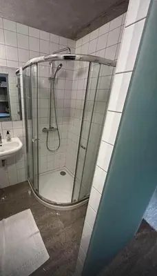 a bathroom with a shower and a sink at Appartement Cannes, Piscine - vue mer - terasse in Cannes