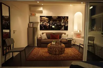 a living room with a couch and a table at Best of the best in Cannes with a beautiful view in Cannes