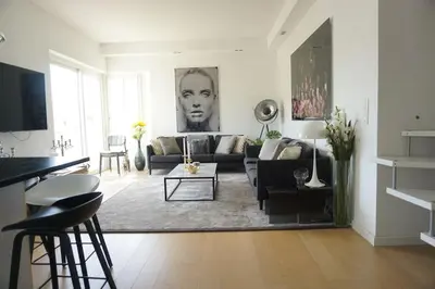 a living room with a couch and a table at Best of the best in Cannes with a beautiful view in Cannes