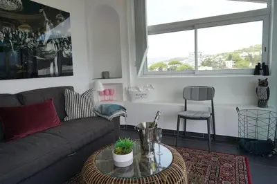 a living room with a couch and a table at Best of the best in Cannes with a beautiful view in Cannes