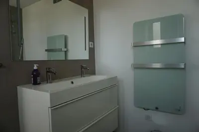 a bathroom with a white sink and a mirror at Best of the best in Cannes with a beautiful view in Cannes