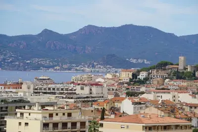 a city with buildings and the water and mountains at Best of the best in Cannes with a beautiful view in Cannes