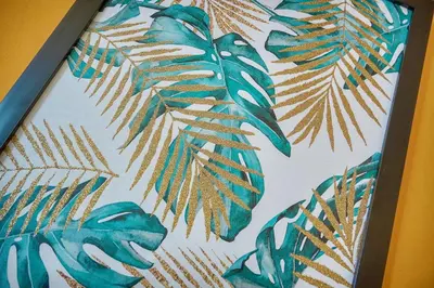 a picture of a painting of leaves on a wall at Fil - Piscine - 2 min Mer - VCA in Cannes
