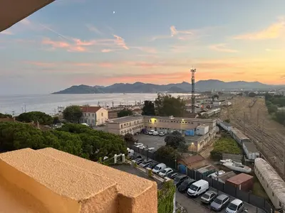 a view of a city with cars parked in a parking lot at Azuria in Cannes