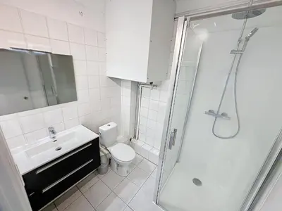 a bathroom with a toilet and a sink and a shower at Central 1 bedroom Riouffe 206 2 mins from Palais in Cannes