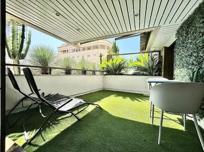 a room with a table and chairs on a balcony at Gray D'Albion -2A8- 1 Chambre in Cannes