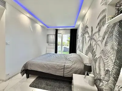 a bedroom with a large bed with a blue ceiling at Gray D'Albion -2A8- 1 Chambre in Cannes