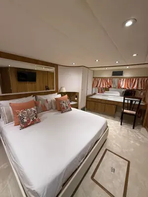 a large bedroom with a large bed and a tub at Zaffiro Yacht - Festival de la plaisance Cannes 2024 in Cannes