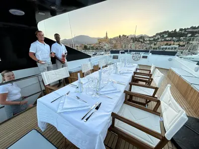 a deck of a boat with benches on it at Zaffiro Yacht - Festival de la plaisance Cannes 2024 in Cannes