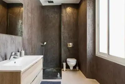 a bathroom with a sink and a toilet at 3 ROOMS - DOWNTOWN CANNES - 2 MIN FROM PALAIS Festivals in Cannes