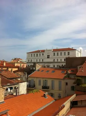 a view of a city with buildings and roofs at 3 ROOMS - DOWNTOWN CANNES - 2 MIN FROM PALAIS Festivals in Cannes