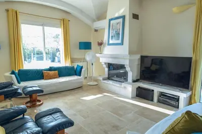 a kitchen with a white counter top in a room at Spacious Villa Vallauris Cannes with AC throughout and large private pool in Vallauris