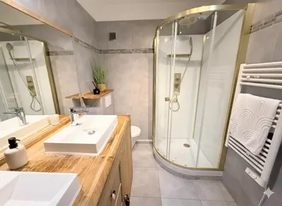 a bathroom with a shower and a sink and a toilet at Appartement terrasse Croisette in Cannes