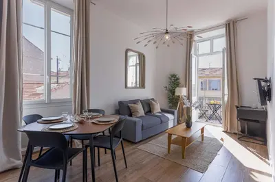 a living room with a table and a couch at 