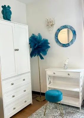 a bedroom with a white dresser and a blue stool at LB Vacation Rentals I Superieure Room 22m2 - Spacious I Casa d'Azur in Cannes