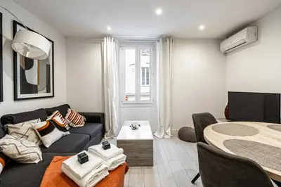 a living room with a couch and a bed at Beautiful apartment, next to Croisette Gray Albion in Cannes